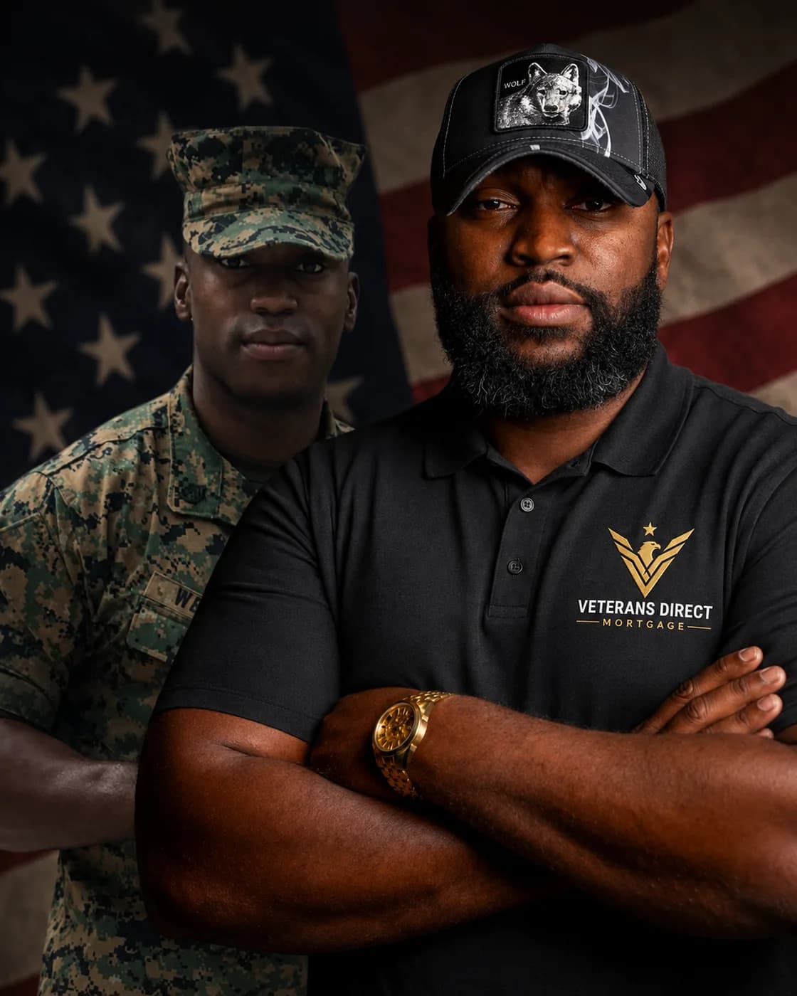 Renaldo Wilson, founder of Veterans Direct Mortgage, wearing a branded polo in front of an American flag